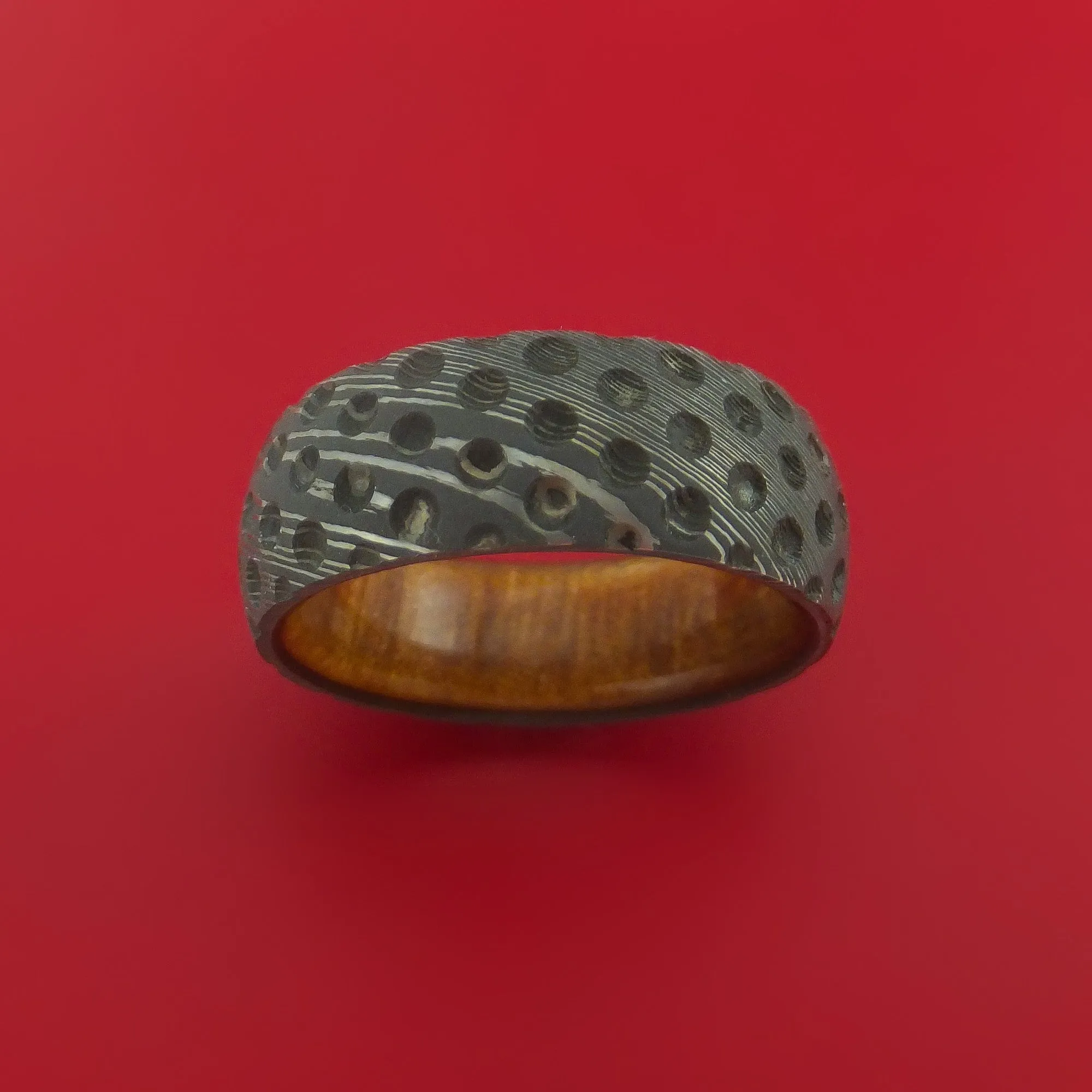 Damascus Steel Ring with Milled Golf Ball Dimple Inlay and Interior Hardwood Sleeve Custom Made Band