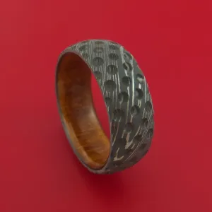 Damascus Steel Ring with Milled Golf Ball Dimple Inlay and Interior Hardwood Sleeve Custom Made Band
