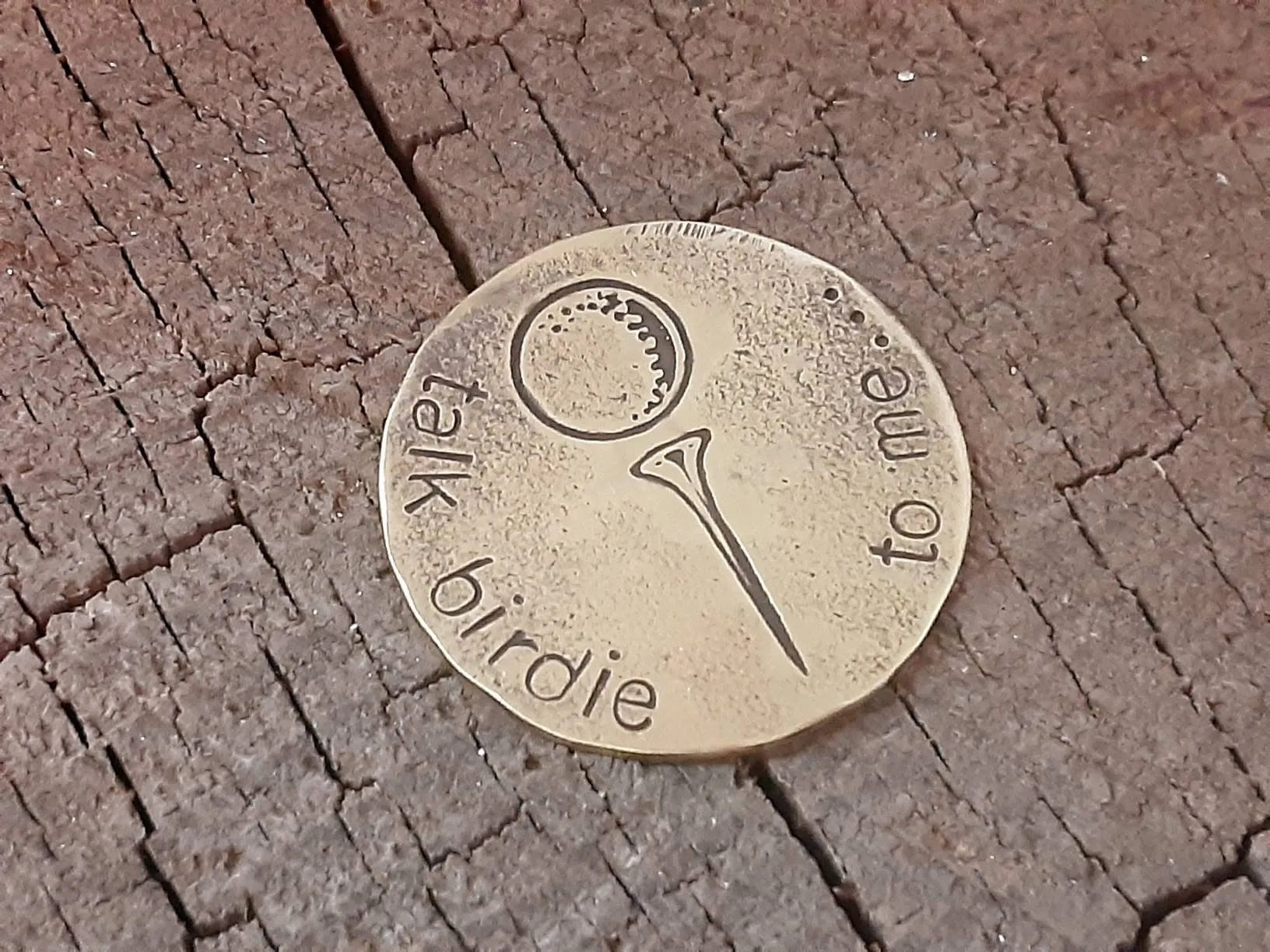 Golf ball marker in various metals