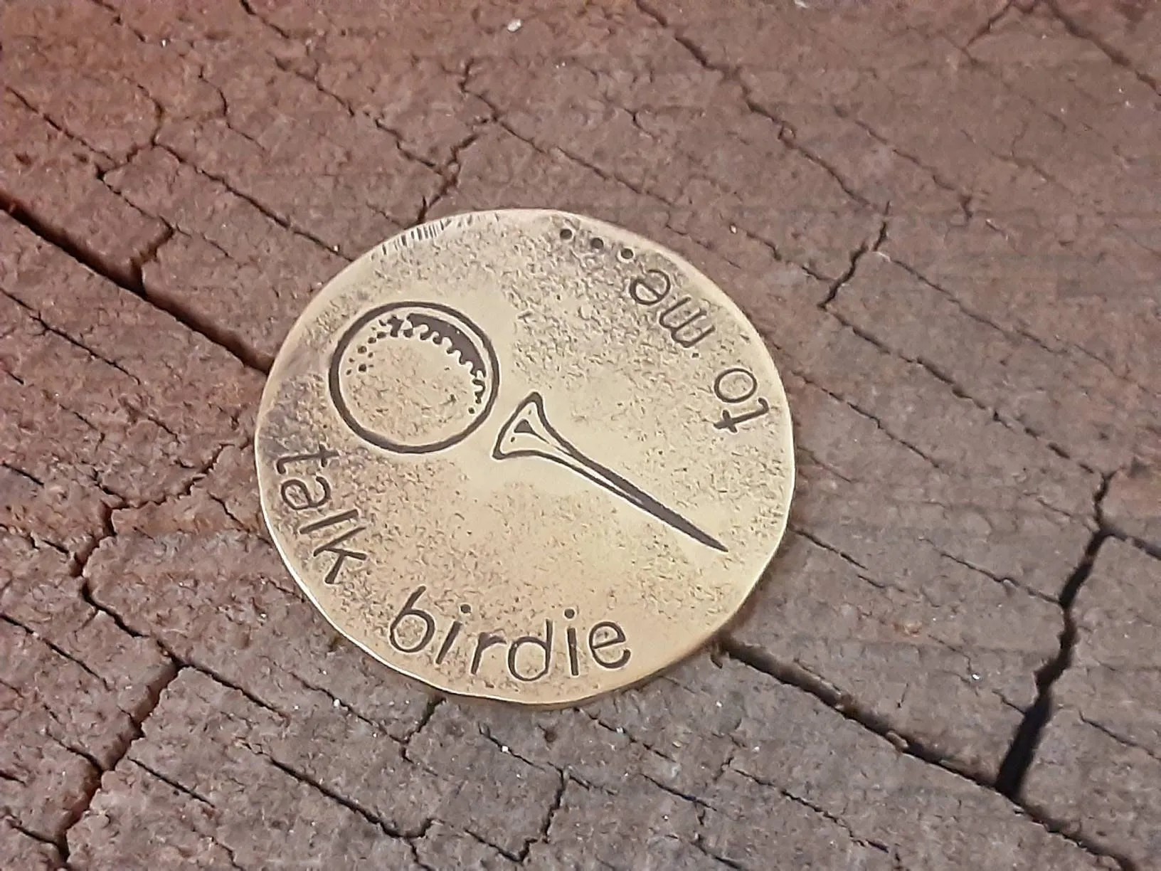 Golf ball marker in various metals