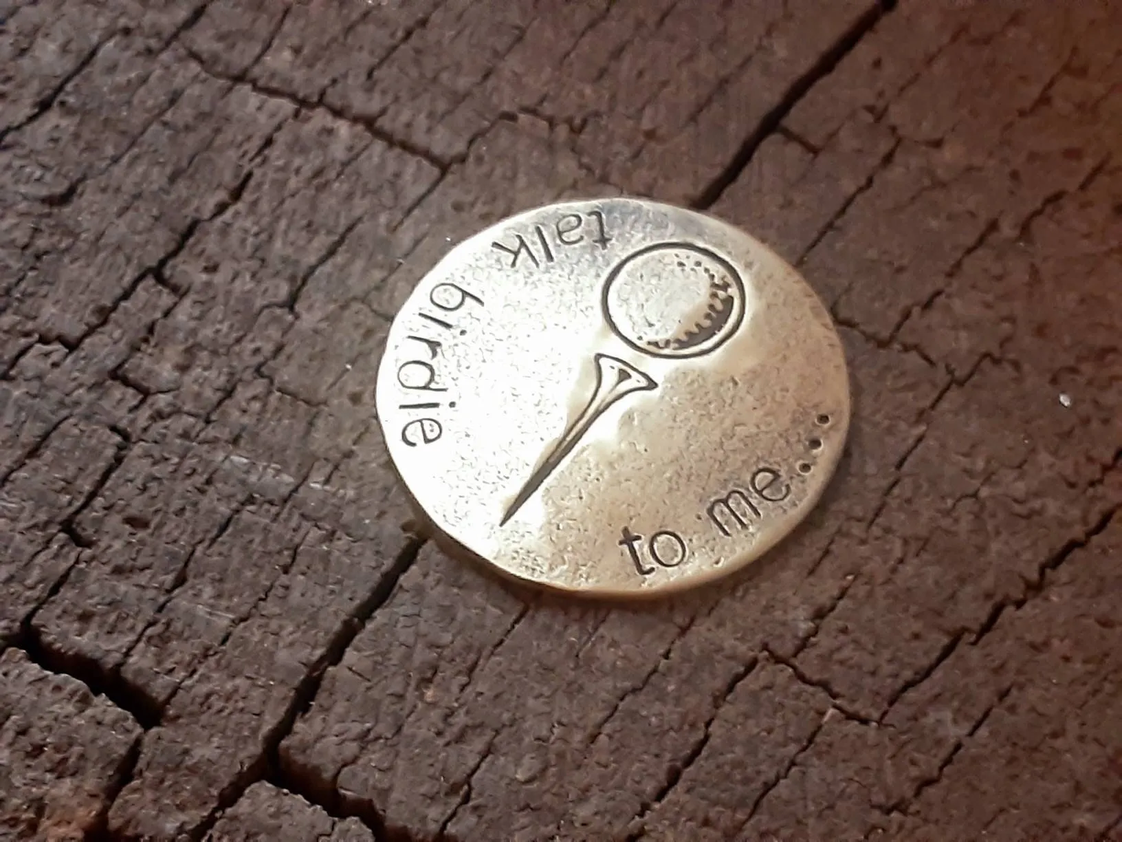 Golf ball marker in various metals