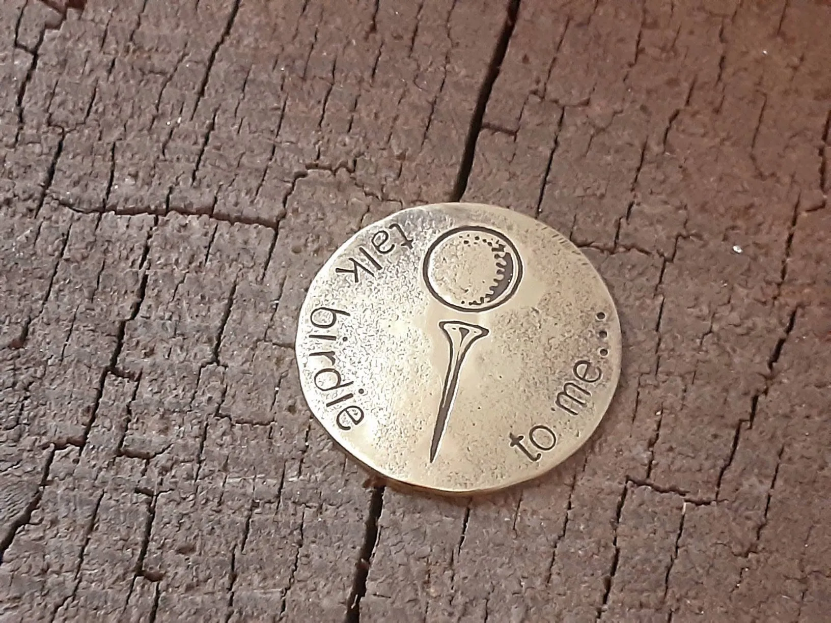 Golf ball marker in various metals
