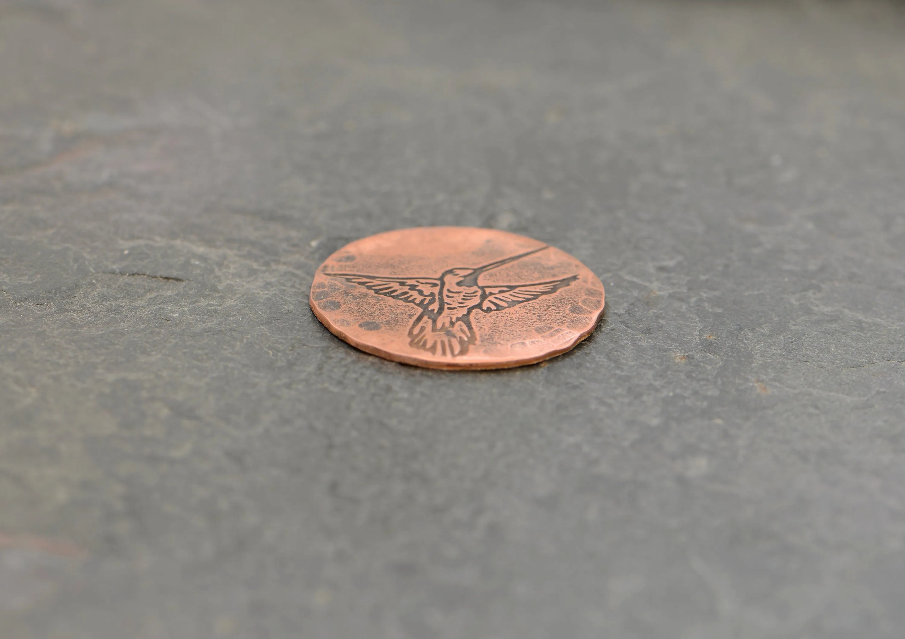 Golf ball marker with hummingbird in Copper
