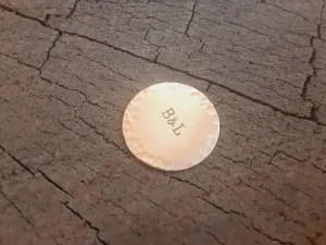 Golf ball marker with your initials in bronze