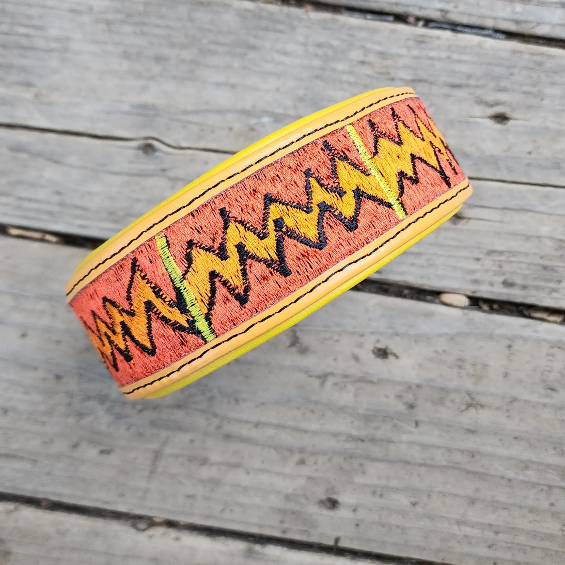 The Sofia (pastel orange with yellow padding)